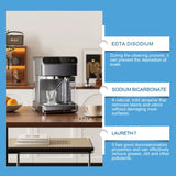 Coffee machine on a kitchen counter with cleaning product information text.